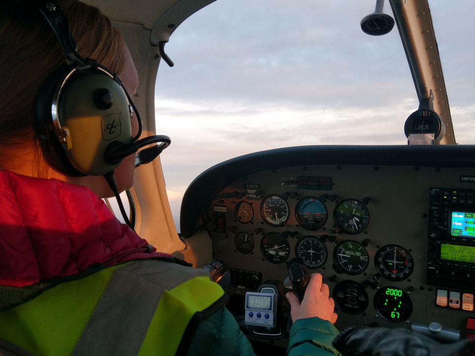 New student having an evening flying lesson over Cornwall in the Piper PA28
