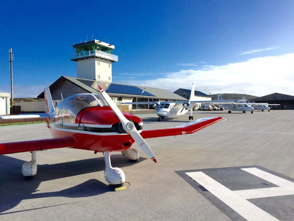 Robin DR400 G-GAOH infront of Land's End Air Traffic Control, with Twin Otter behind